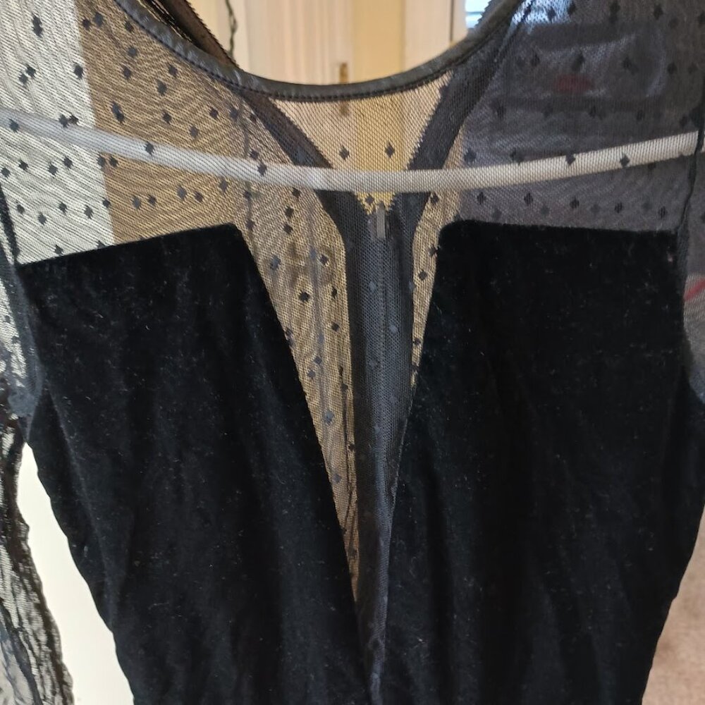 Black Velvet + sheer plunge + polka dots- Girly meets sexy!